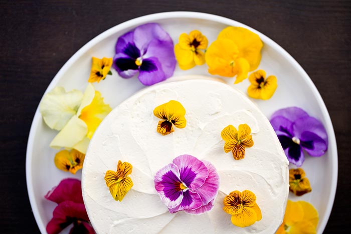 cake with edible pansies